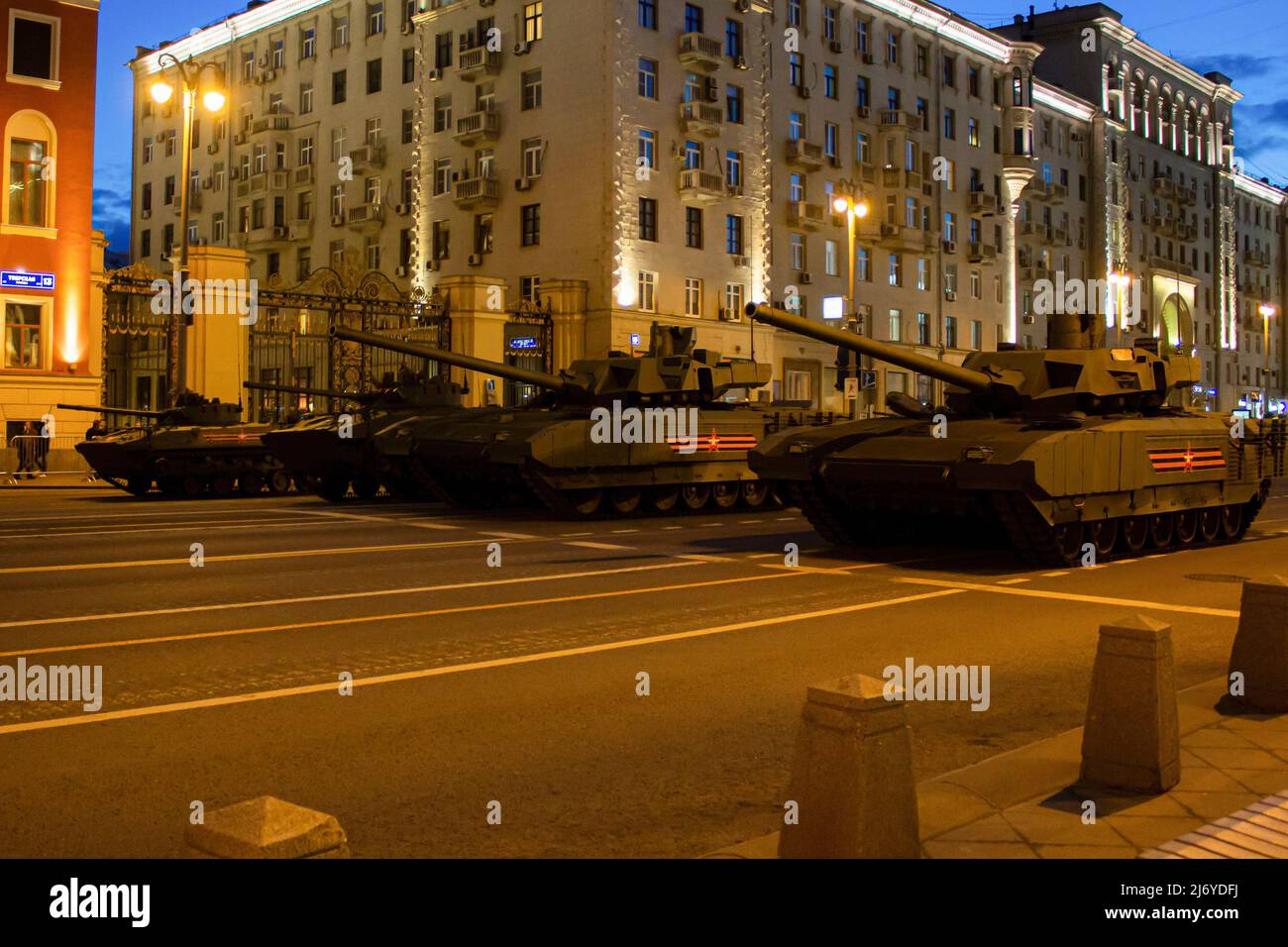 The T-14 Armata tanks seen in formations in front of the mayor's residence on Tverskaya street in Moscow. The final night rehearsal of the traditional Victory Day Parade is one of the main runs before the actual event scheduled for May 9. Besides its symbolic meaning, the yearly Victory Day Parade has been a tool to demonstrate Russia's new weaponry to potential adversaries. Stock Photo