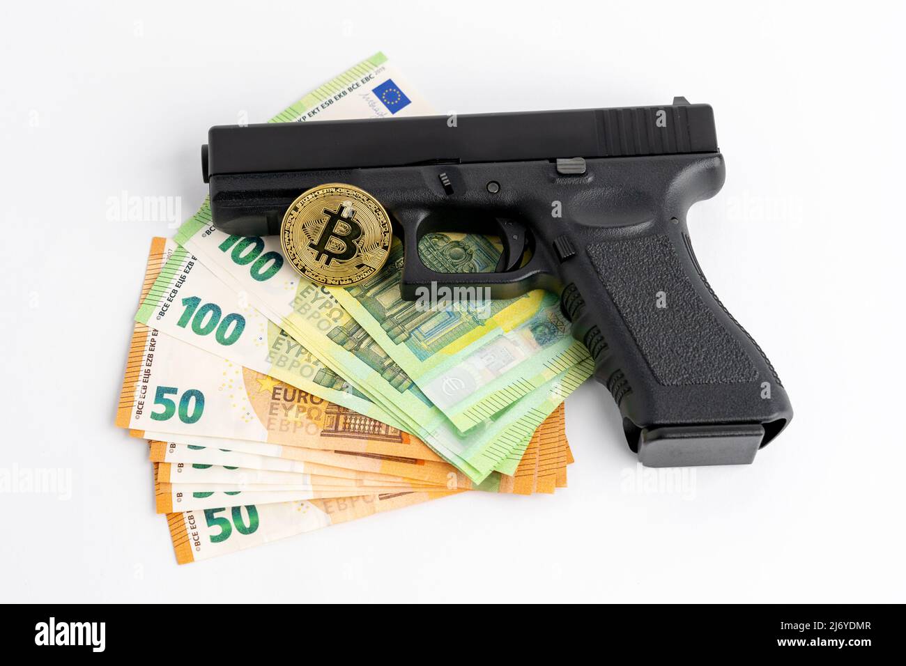 Gun, Bitcoin and Euro banknotes on a white background. Symbols of crime in  the darknet and real world. Cash money and BTC used as payment Stock Photo  - Alamy