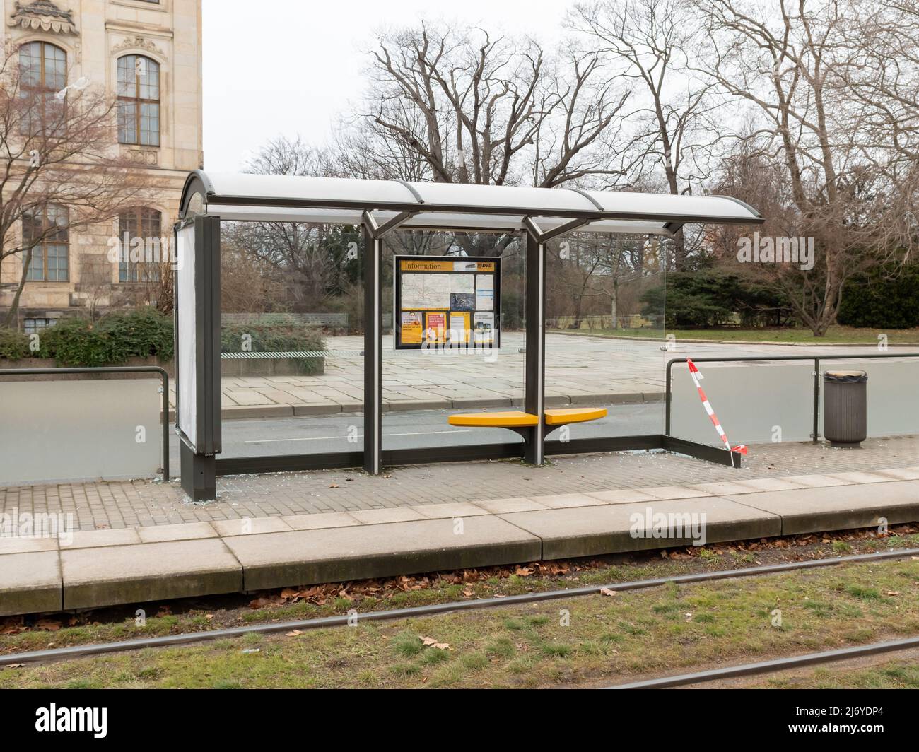 Demolished tram stop with broken glass due to vandalism. Property damage to Dresdner Verkehrsbetriebe AG at 'Japanisches Palais' Stock Photo