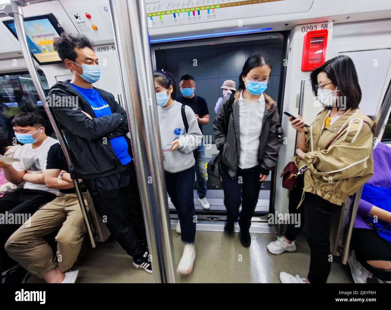 BEIJING, CHINA MAY 5, 2022 Passengers transfer during the morning rush hour at Dongsi Subway