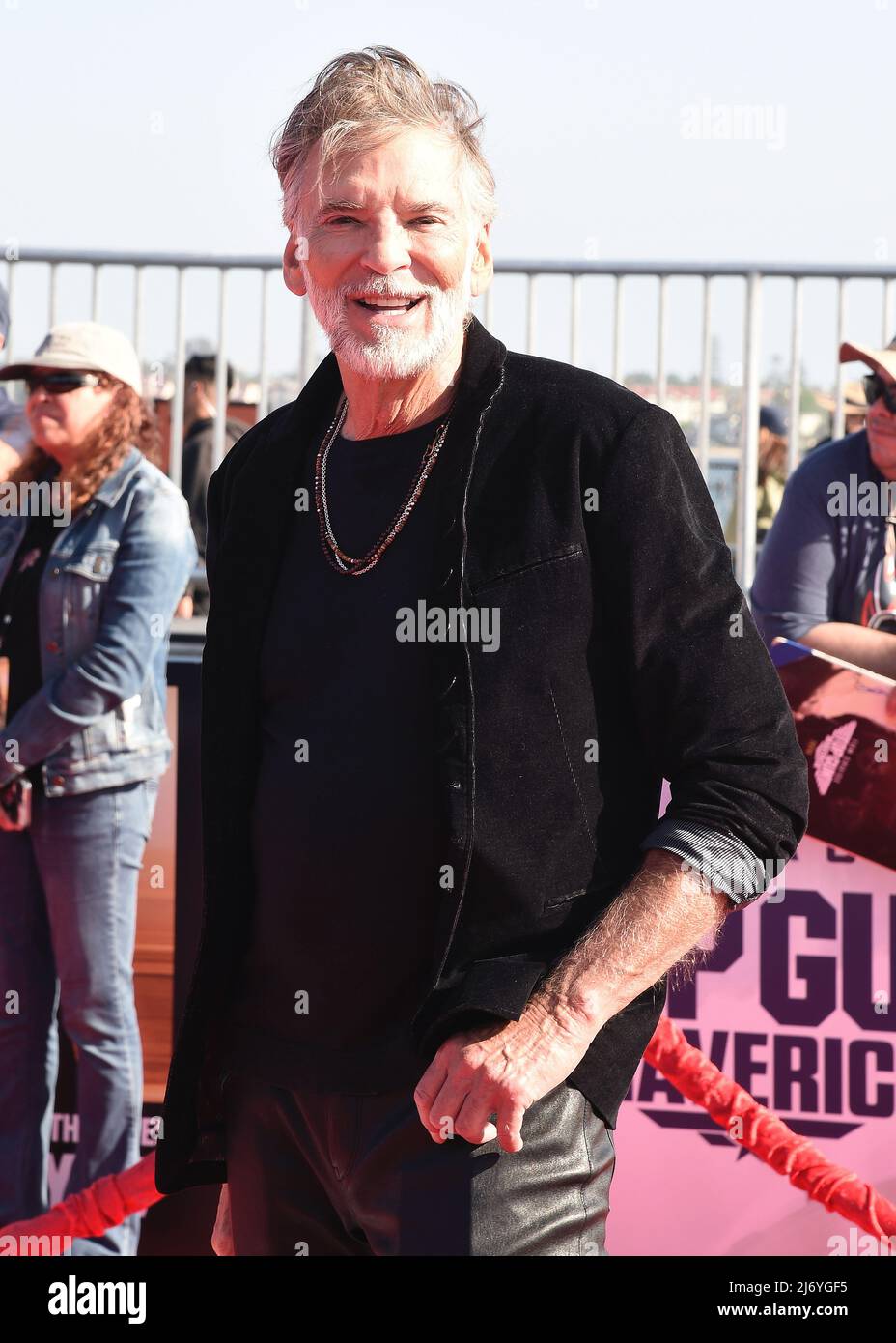 Kenny Loggins walking on the red carpet at the global premiere of "Top