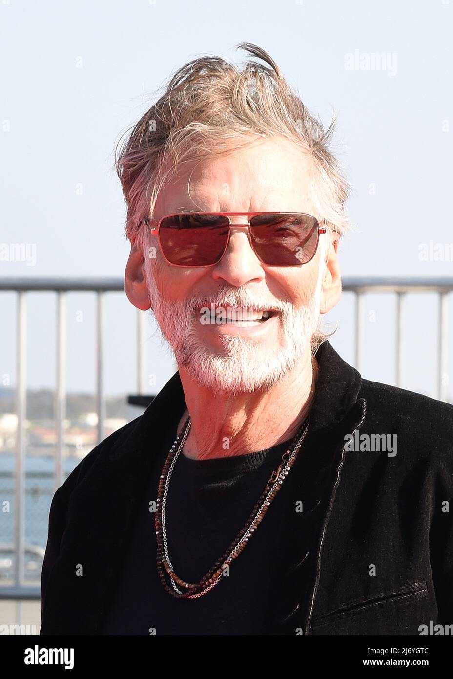 Kenny Loggins walking on the red carpet at the global premiere of "Top