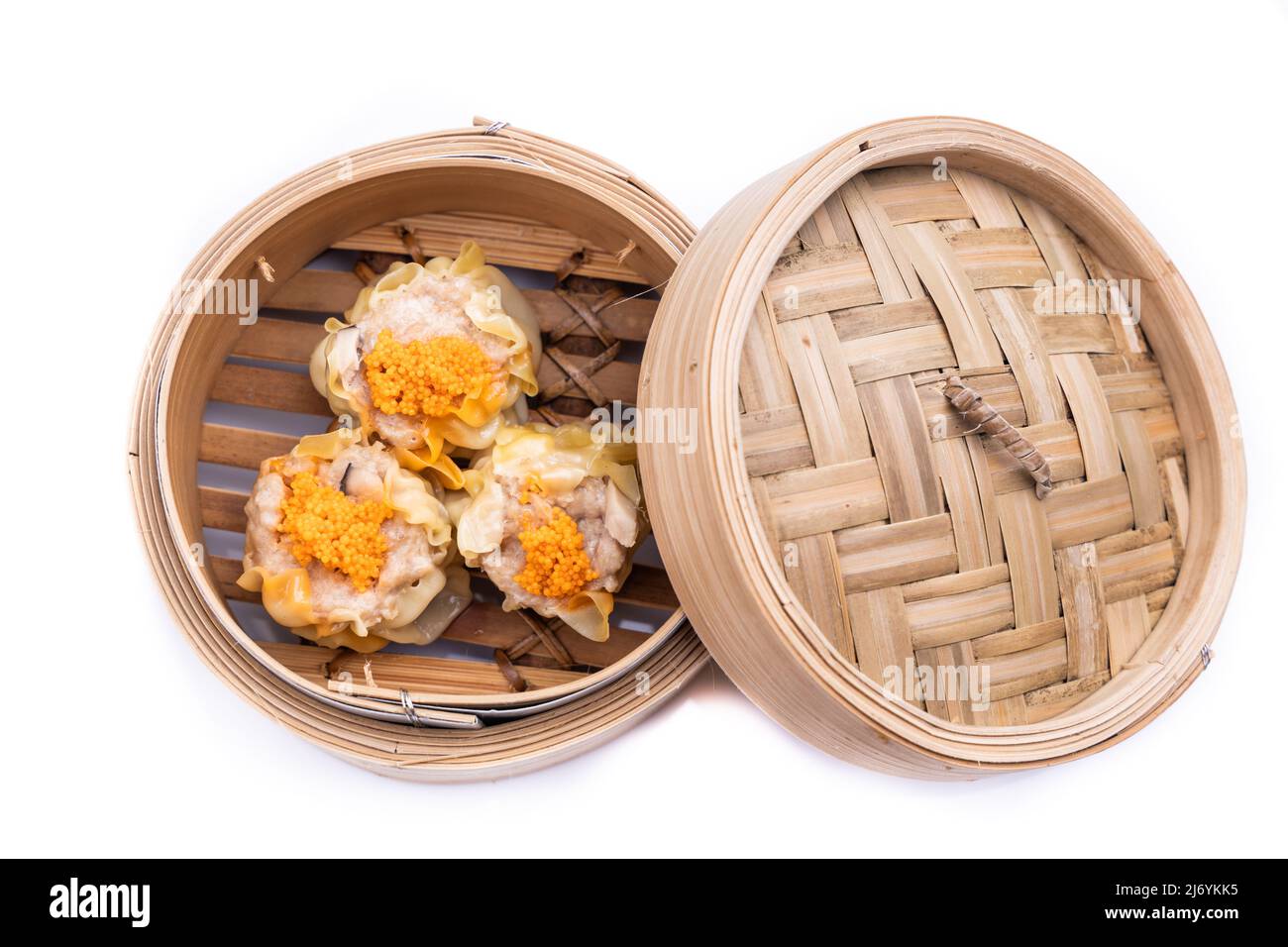 Freshly steamed siew mai or shaomai is poular Cantonese Chinese dim sum delicacy Stock Photo