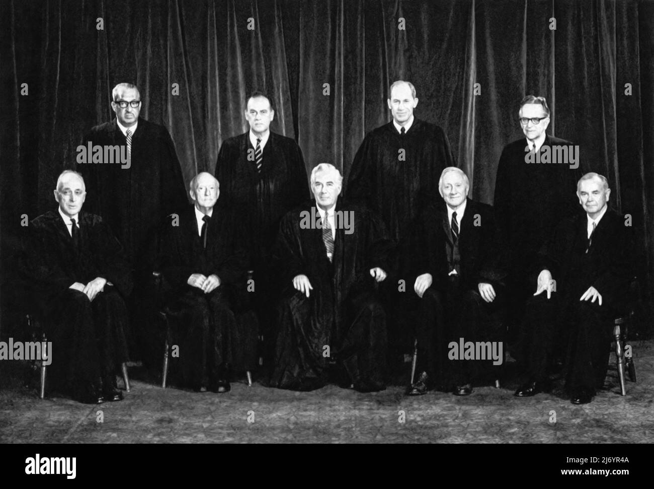 U.S. Supreme Court official group portrait on January 23, 1971. This court would later hear the initial argument in the Roe vs. Wade abortion case on December 13, 1971. The case was reargued October 11, 1972 with retired Justices Black and Harlan being replaced by Justices Powell and Rehnquist. Row vs. Wade was decided on January 22, 1973. Stock Photo