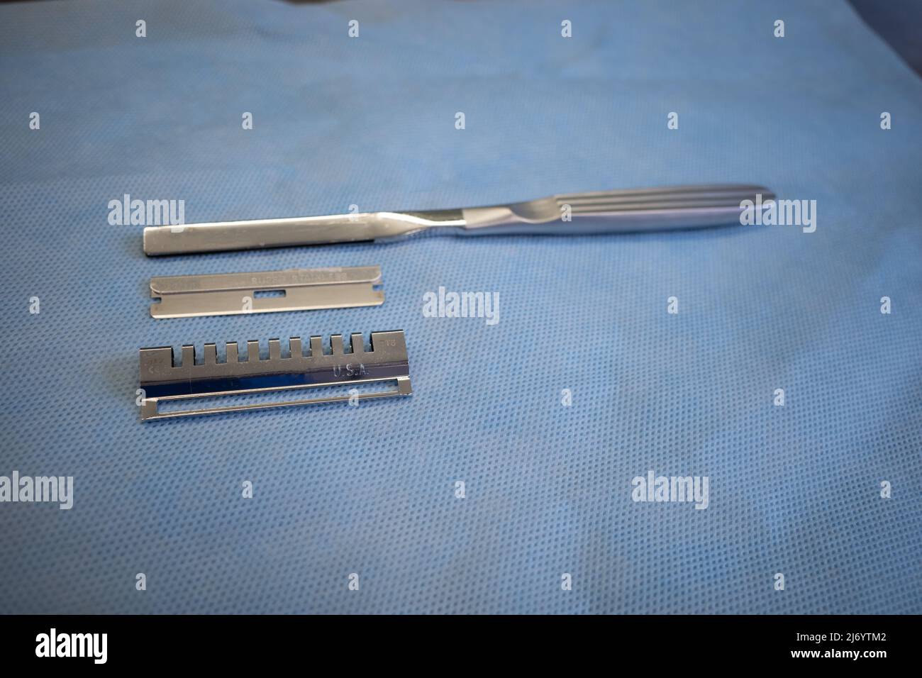 a dermatome knife to remove skin for transplantation Stock Photo Alamy