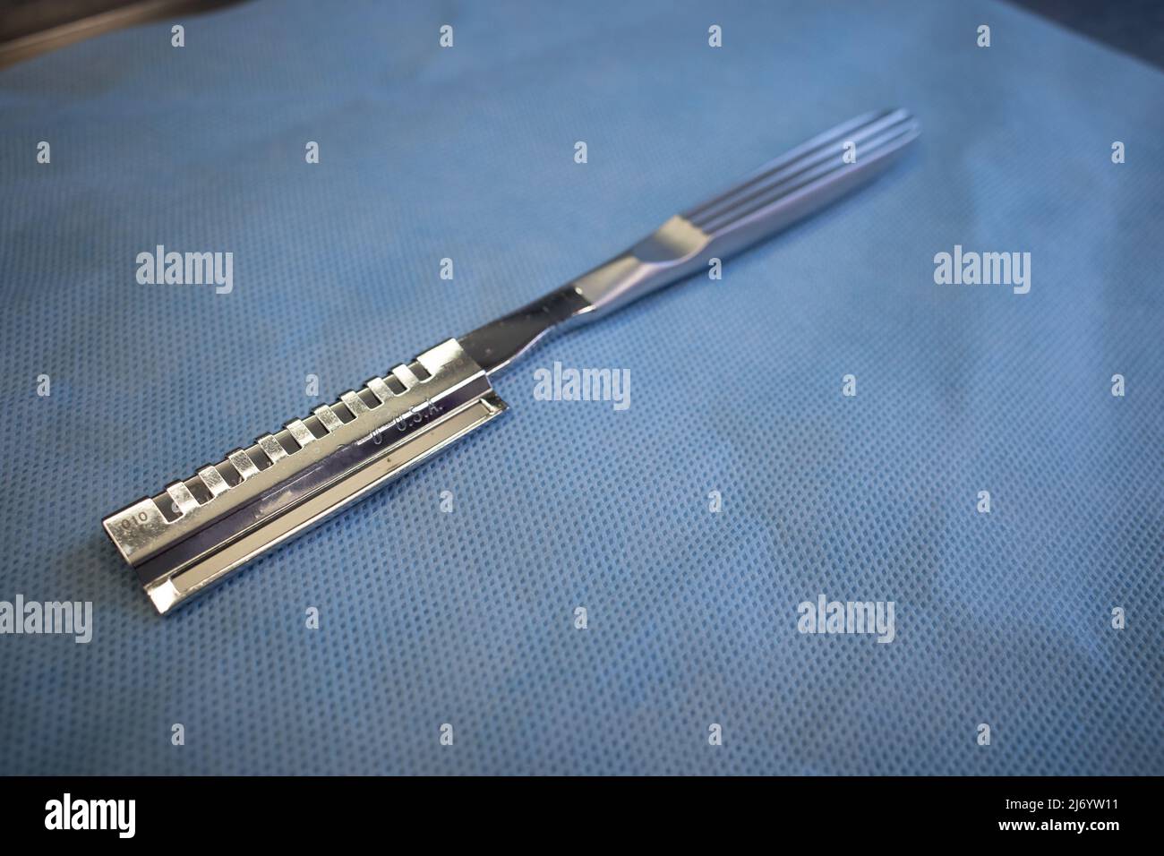a dermatome knife to remove skin for transplantation Stock Photo Alamy