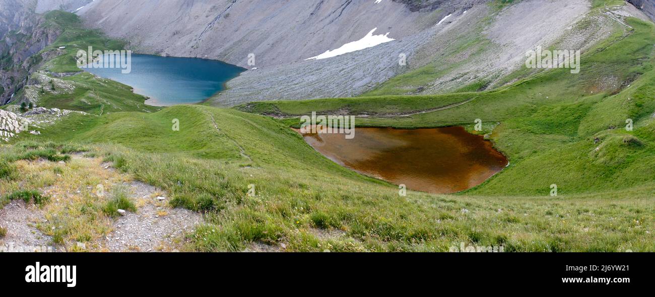 Scenic landscape with two colorful mountain lakes in swiss alps Stock Photo