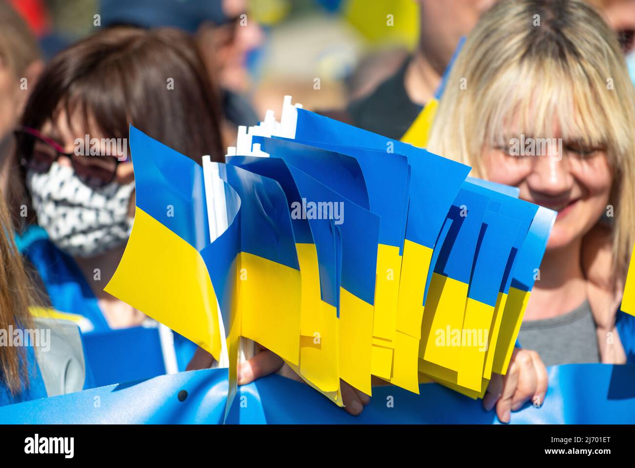 protesters at the London Stands With Ukraine demonstration rally, central London, in protest of President Vladimir Putin's Russian invasion of Ukraine Stock Photo