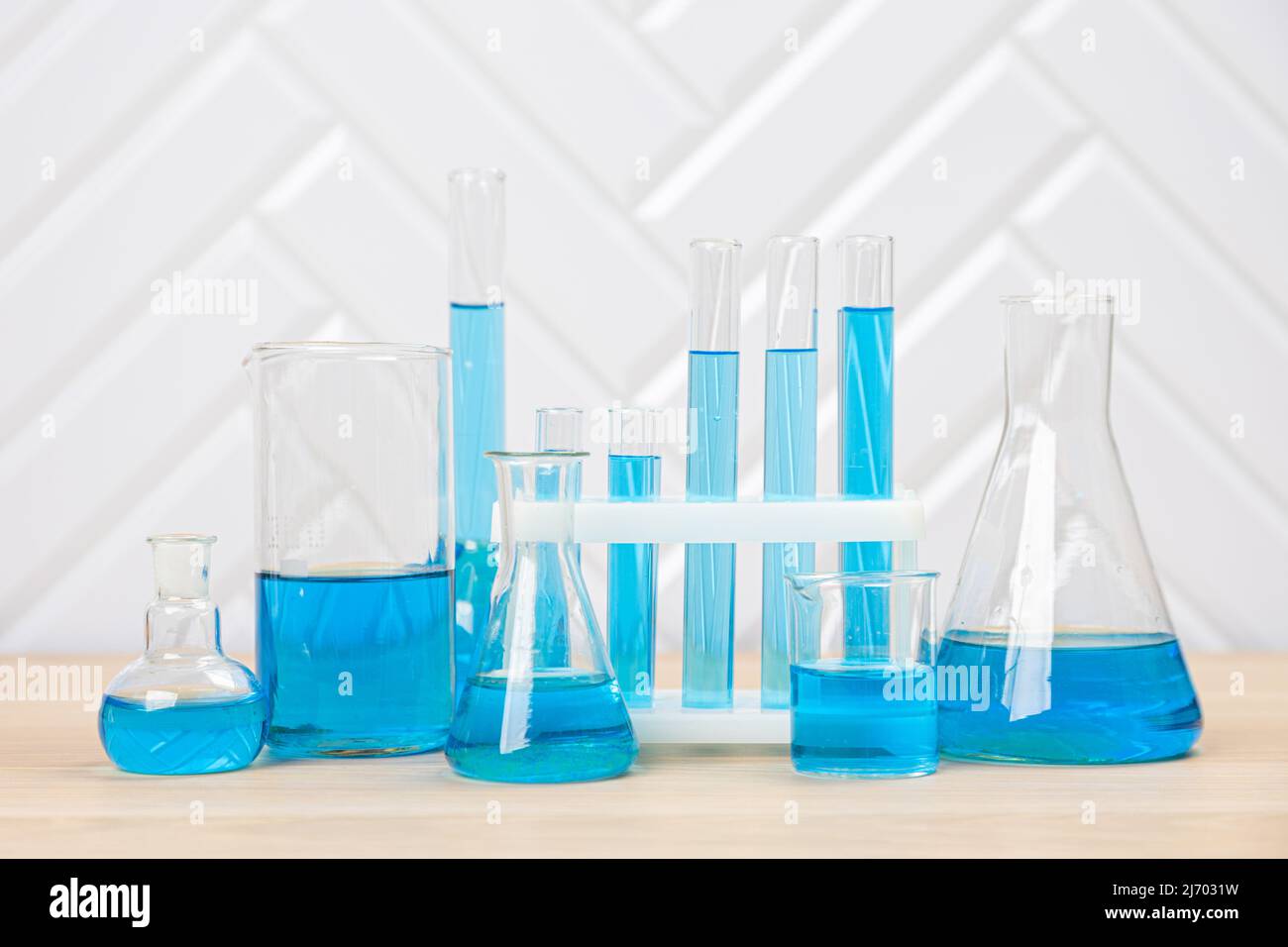 Laboratory glassware with test tubes. flasks, dropper, petri dishes