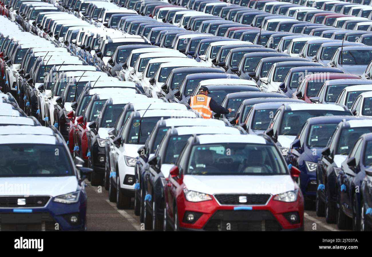 File photo dated 04/10/2019 of new cars on the dockside in Sheerness, Kent. The UK car industry has downgraded its forecast for the number of cars it expects to sell this year by 9%. Around 1.72 million new cars will be registered in 2022, according to the Society of Motor Manufacturers and Traders (SMMT). Issue date: Thursday May 5, 2022. Stock Photo