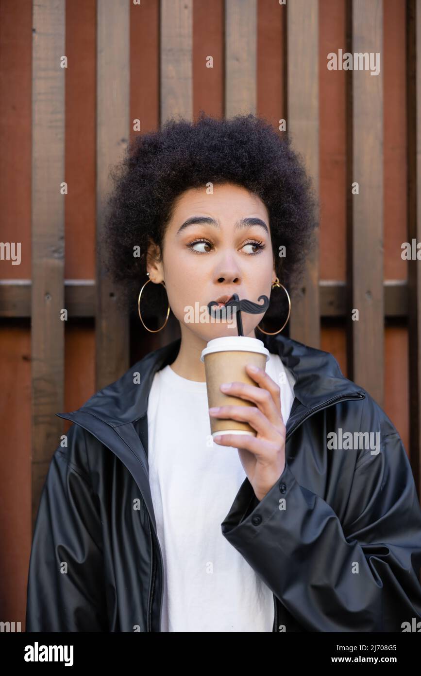 Attractive woman fake moustache hi-res stock photography and images - Alamy