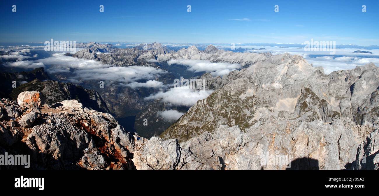 Autumn in mountains in European Alps. View from the highest peak of Slovenia, Triglav - 2864 m Stock Photo