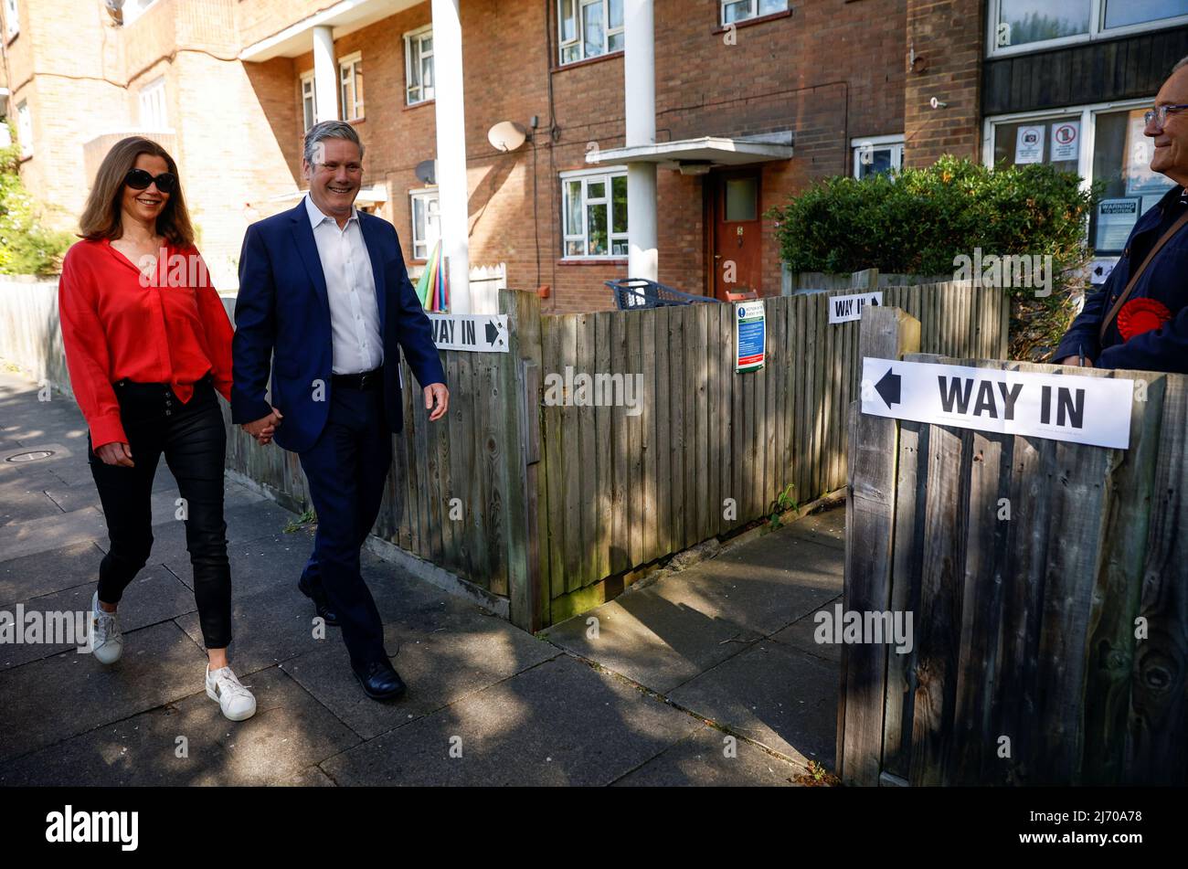 British Labour Party leader Keir Starmer and wife Victoria Starmer arrive at a polling station during the local elections in Kentish Town, London, Britain May 5, 2022. REUTERS/John Sibley Stock Photo