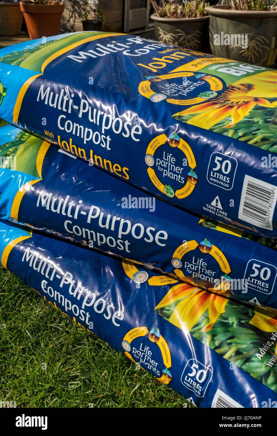 Close up of bags of multi purpose potting compost with John Innes England UK United Kingdom GB Great Britain Stock Photo