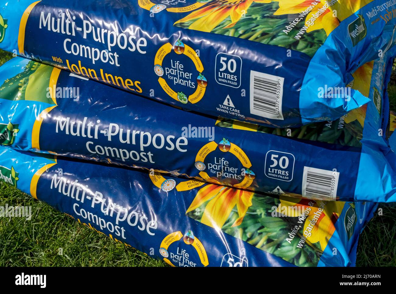 Close up of bags of multi purpose potting compost with John Innes England  UK United Kingdom GB Great Britain Stock Photo - Alamy