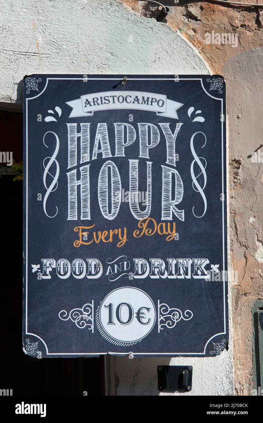 Happy Hour sign of a restaurant in Trastevere, Rome, Lazio, Italy Stock