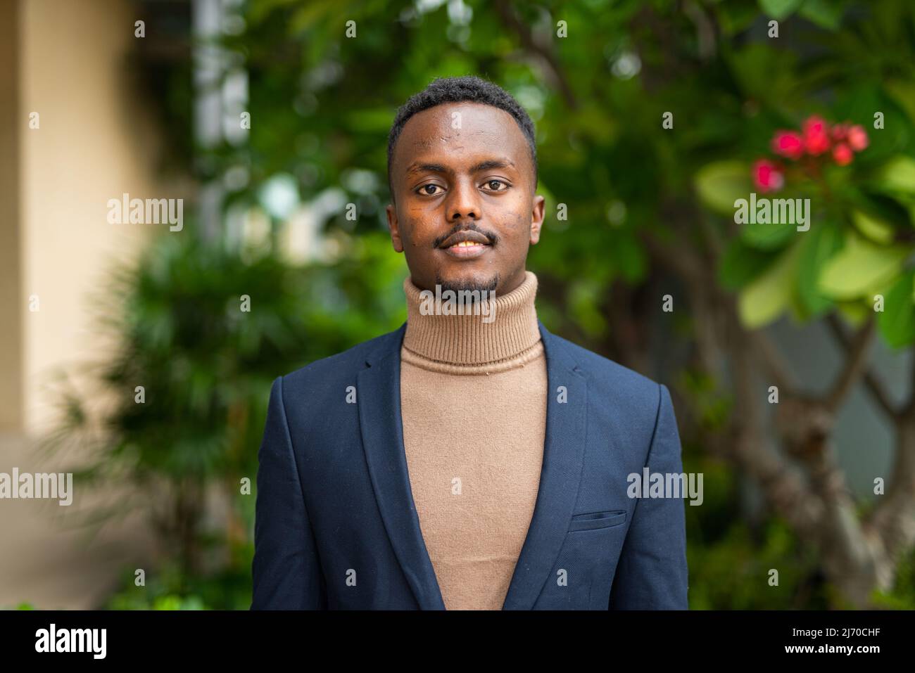 Young smiling black successful hi-res stock photography and images - Alamy