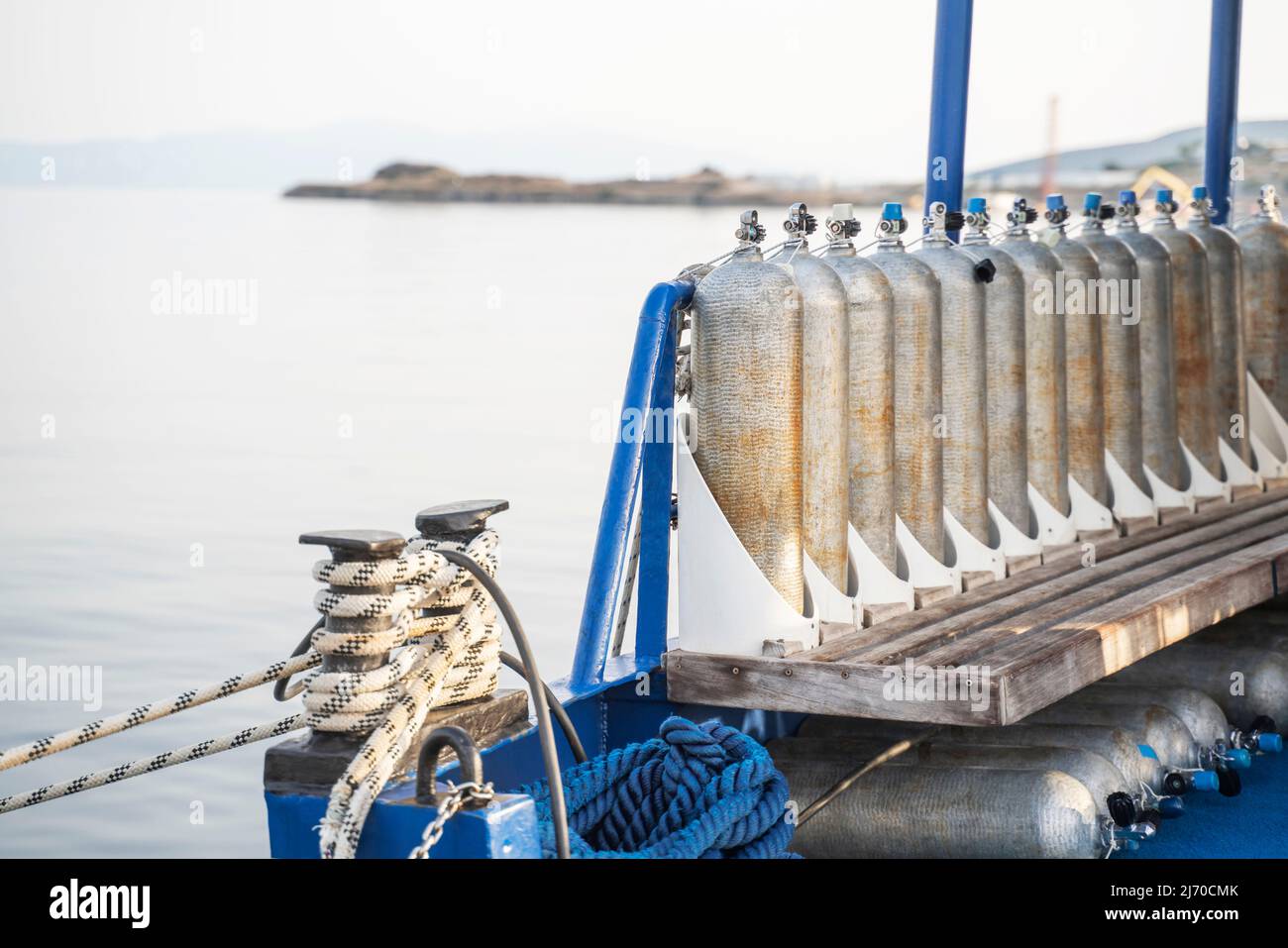 Row of full oxygen tanks for scuba diving Stock Photo Alamy