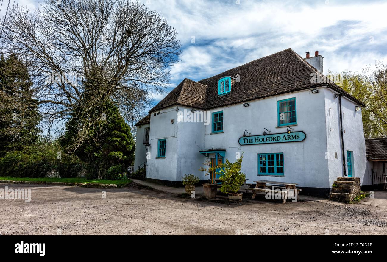 The Holford Arms 16th Century Public House on the border of Gloucestershire and Wiltshire, England, United Kingdowm Stock Photo