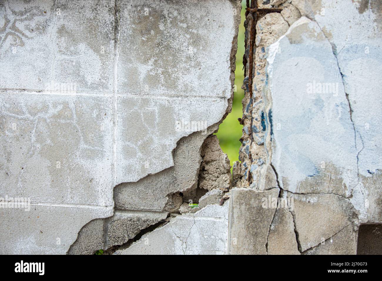 crack damaged concrete cement building from land moving or earthquake