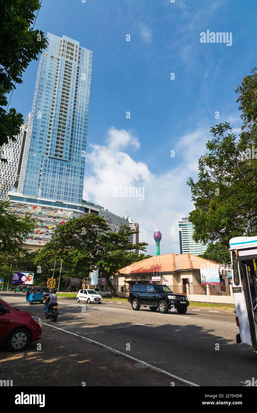 Colombo, Sri Lanka - December 3, 2021: Colombo street view, vertical photo with modern residental buildings and Lotus Tower on a background Stock Photo