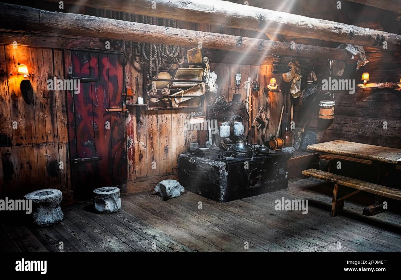 Sunbeams coming through the roof in Traditional Fareoese rustic house interior in Village of Kirkjubour. Denmark, Northern Europe. Stock Photo