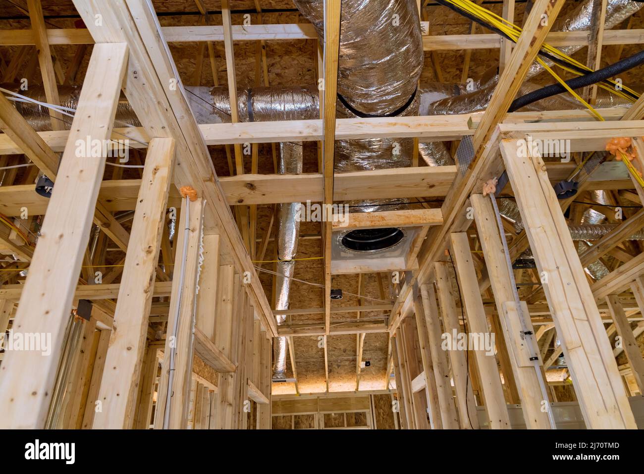 A under construction new building with HVAC tubing vents heating system