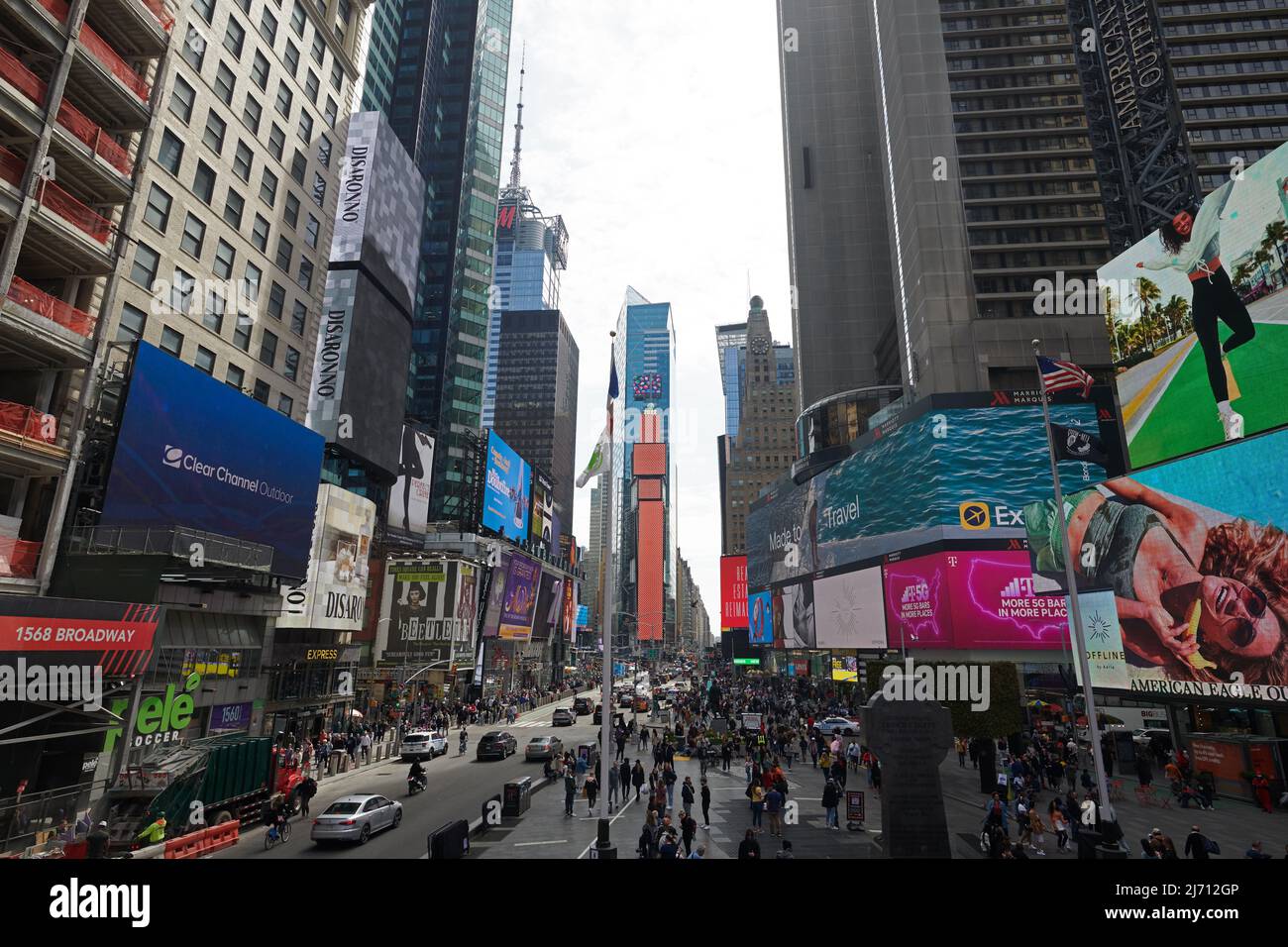 Time Square in Manhattan New York City in the day is always busy and attracts thousands of tourists Stock Photo
