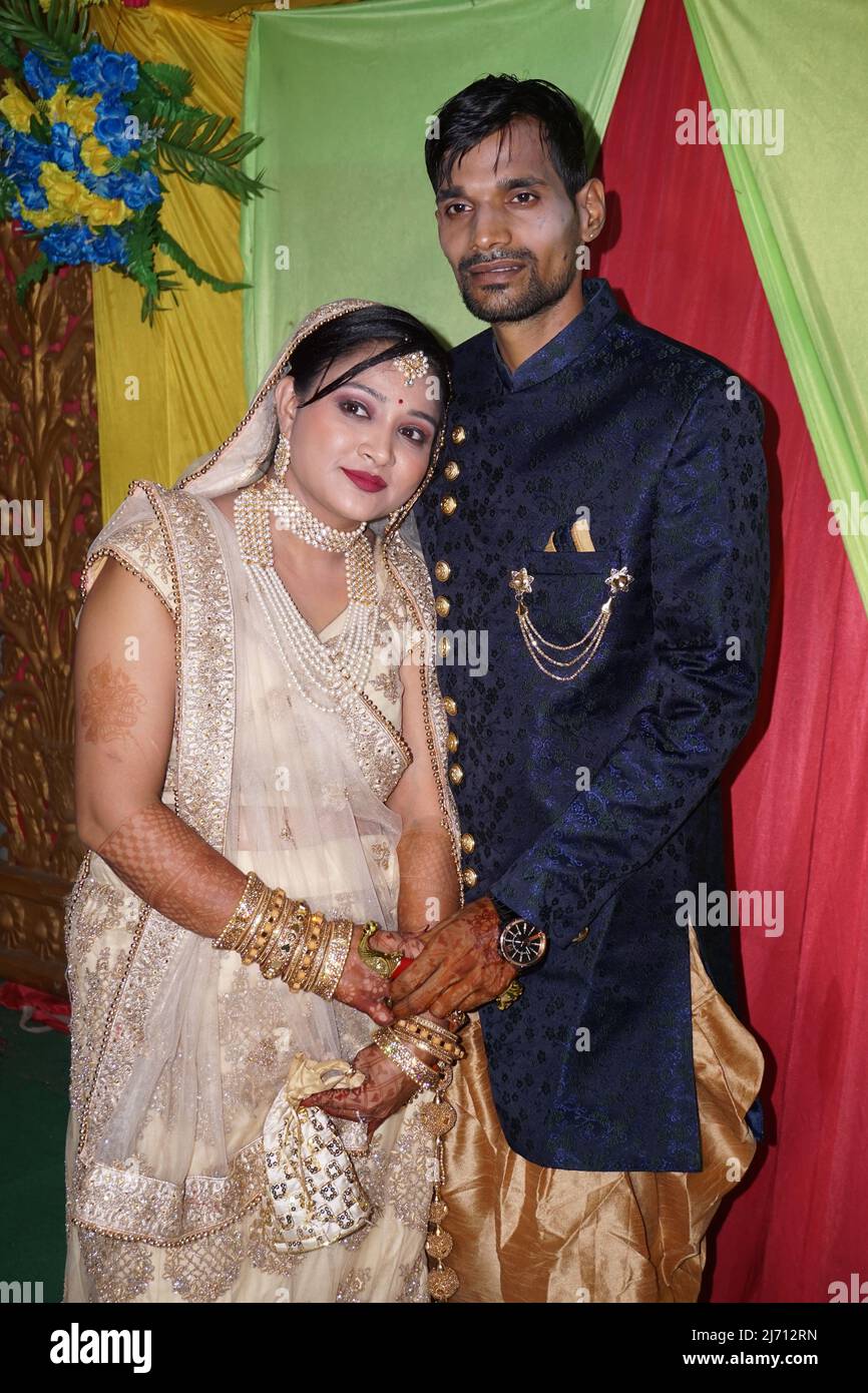 The traditional wedding of indian people is happening at the temple. Indian traditional marriage ceremony that's full of tradition and culture. Stock Photo