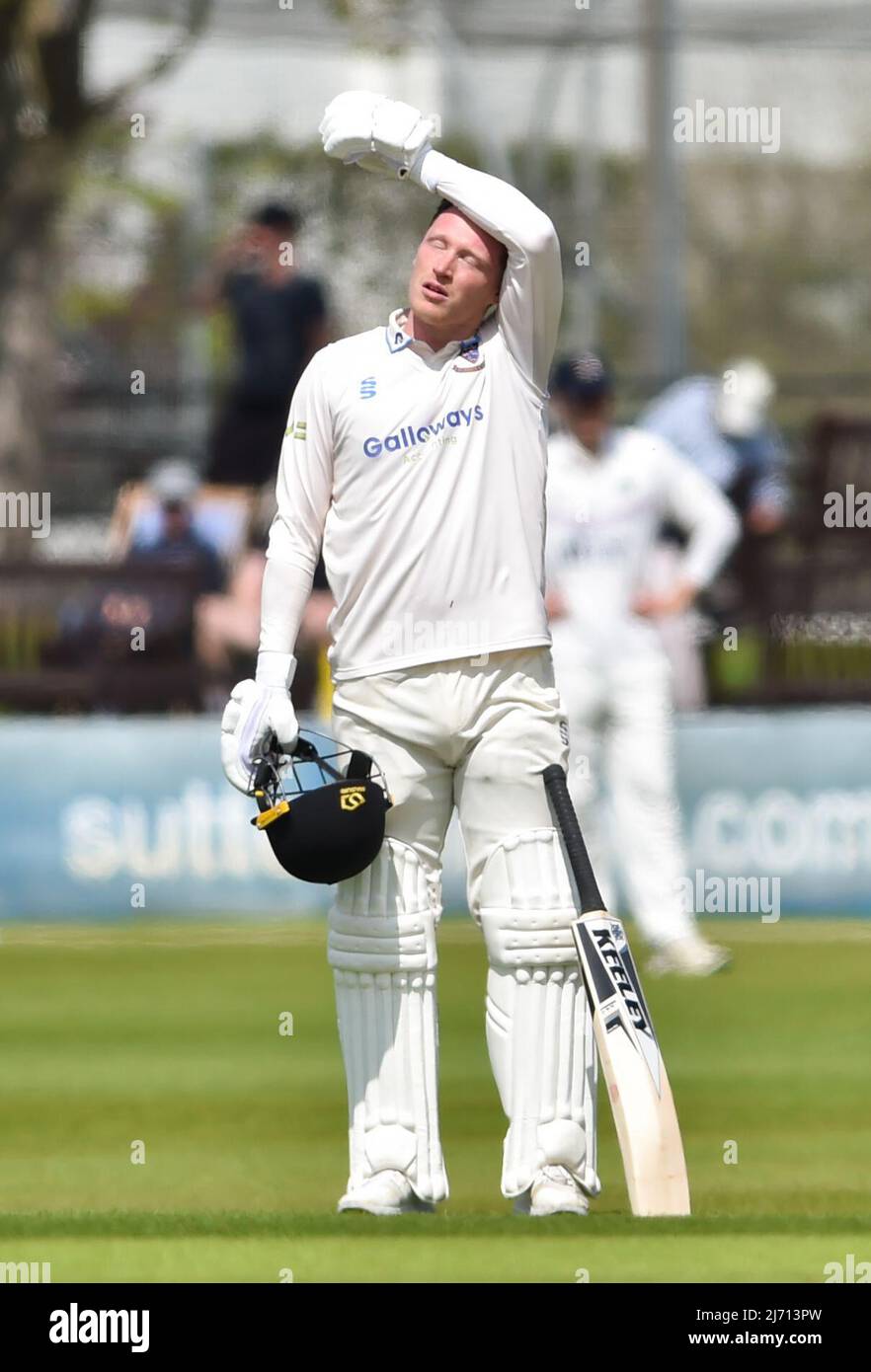Hove UK 5th May 2022 - Tom Alsop batting for Sussex takes a breather against Middlesex on the first day of their LV= Insurance County Championship match at The 1st Central County Ground  in Hove . : Credit Simon Dack / Alamy Live News Stock Photo