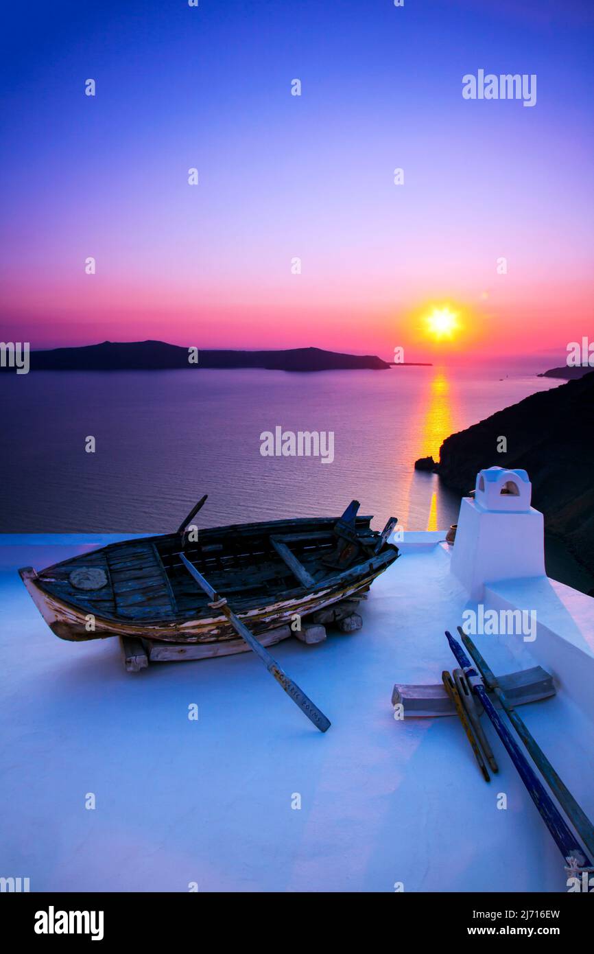santorini purple sunset,santorini, purple sunset,purple,sunset,sunrise,greece,greek,island,boat,aegean sea,thera,fira,thira,sea,aegean,thira santorini Stock Photo