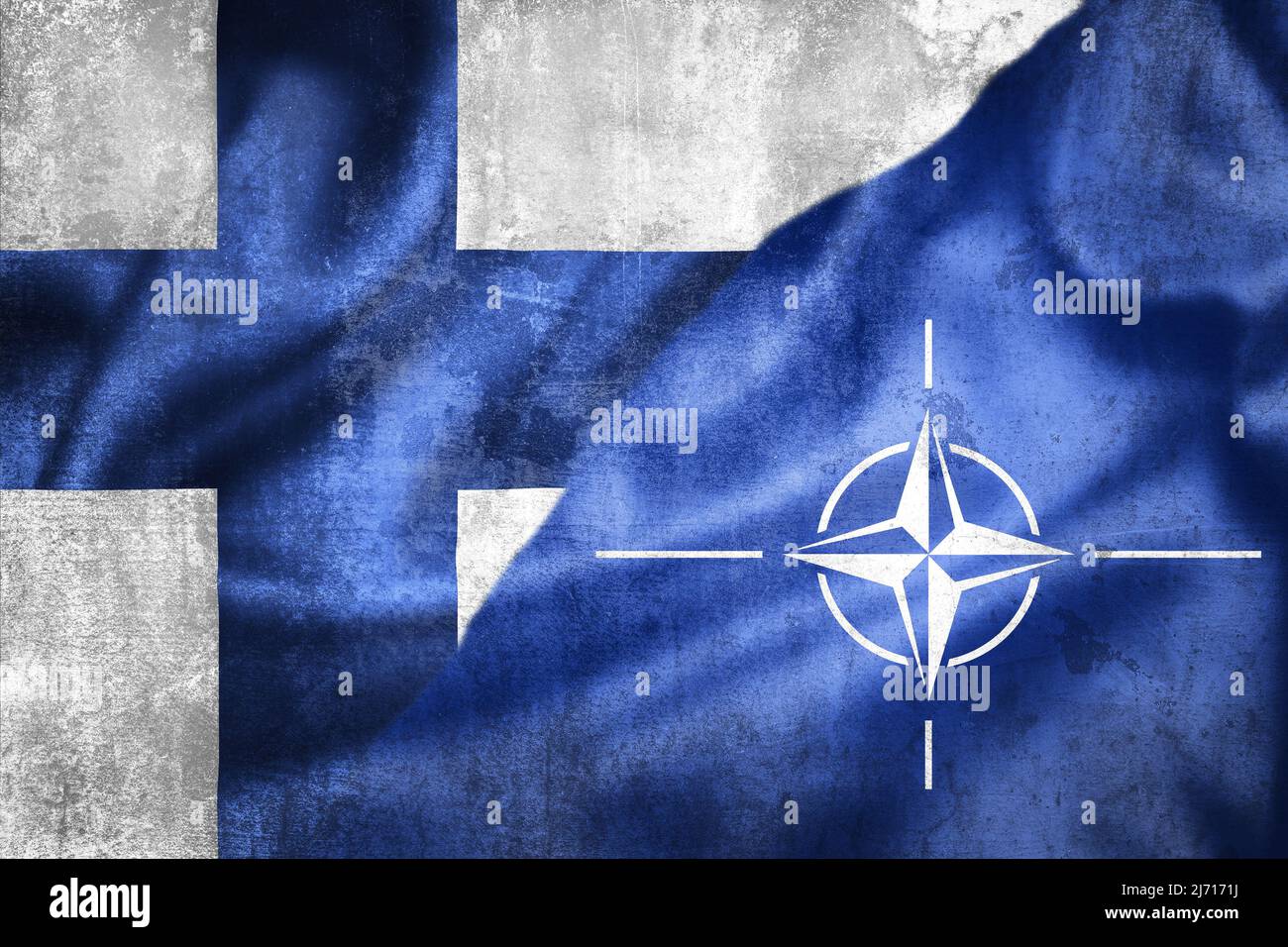 Helsinki, Finland - May 3 2022: Grunge flags of Finland and NATO illustration, concept of Finland plans to enter NATO Stock Photo
