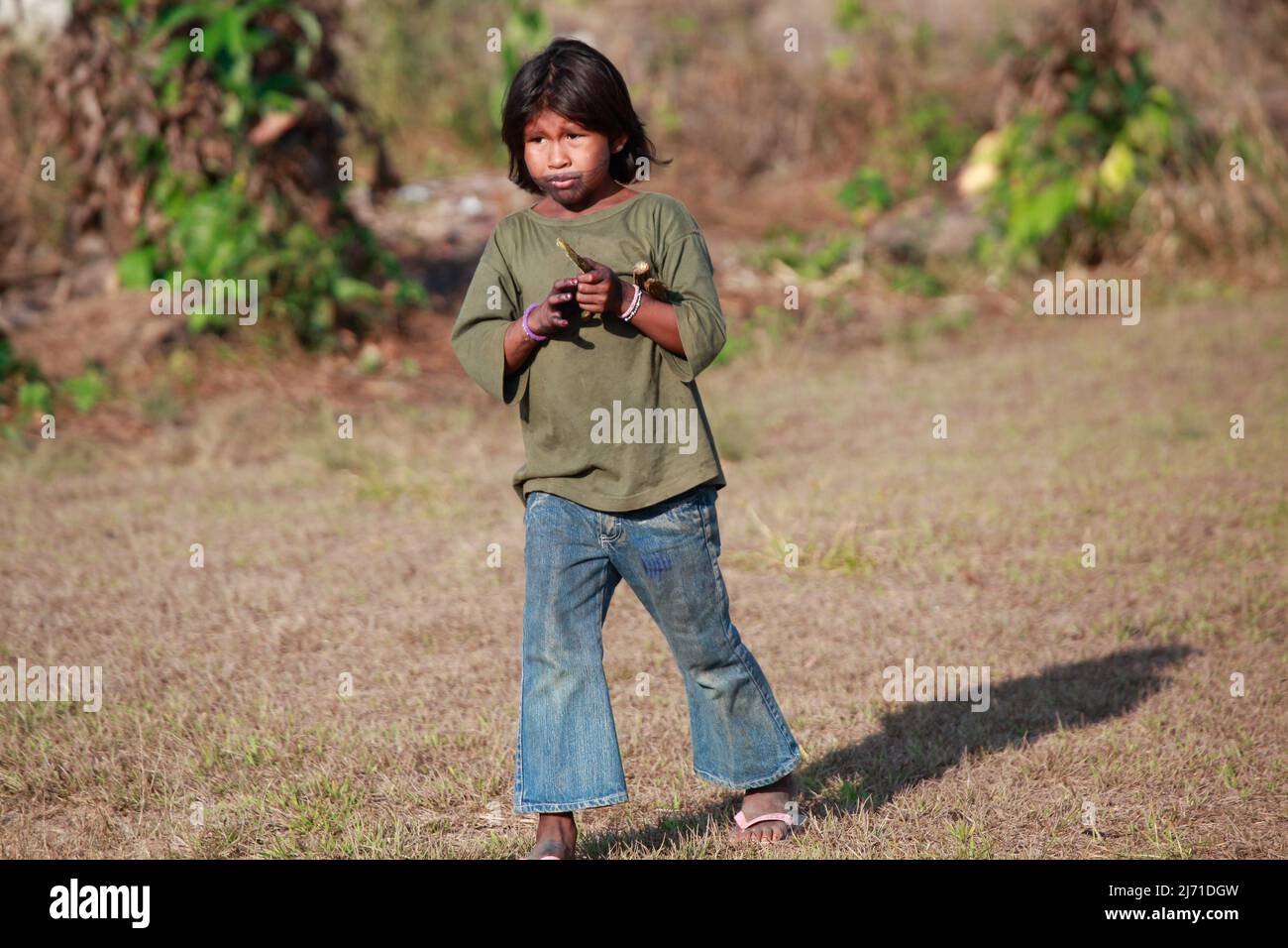 Indian girl wearing jeans and t-shirt. Modern indian. Baixo Amazonas, Pará State, Brazil, 2010. Stock Photo