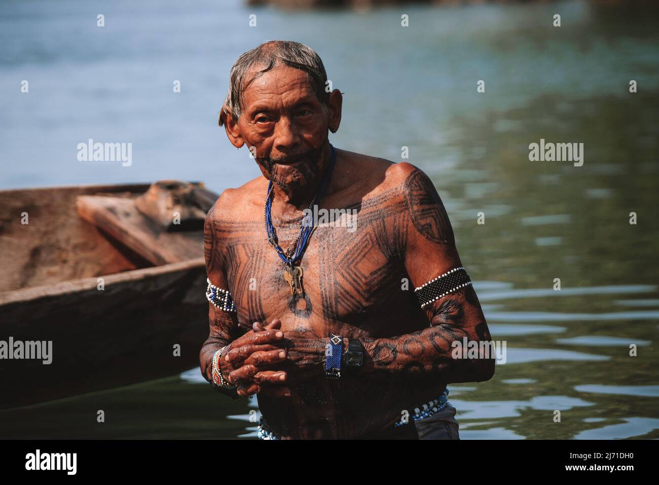 Head of the Asurini tribe of Baixo Amazonas refreshing at Xingu River, Pará State, Amazon, Brazil. 2010. Stock Photo