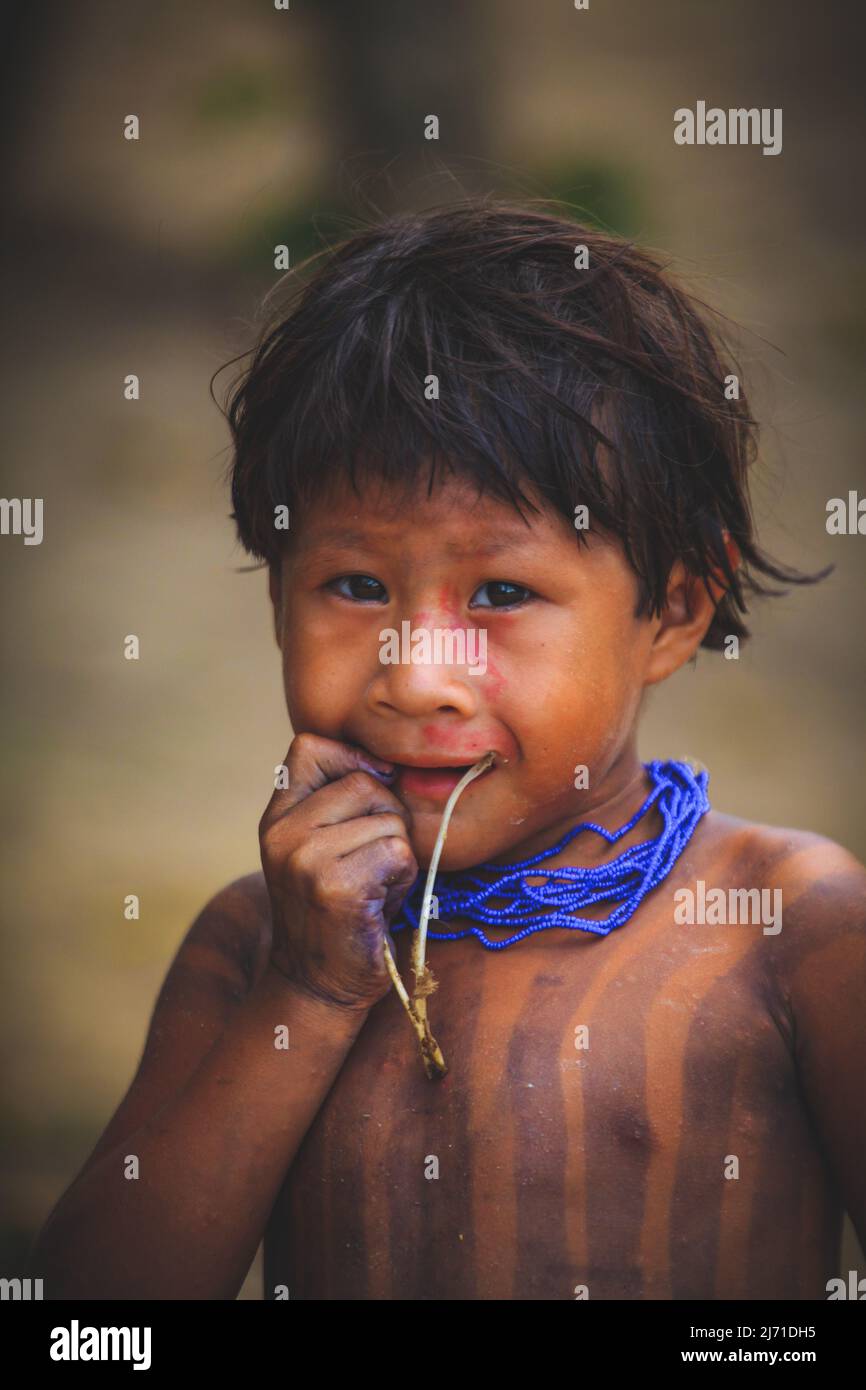 Portrait of indigenous boy from the Asurini tribe in the Brazilian Amazon. Brazilian natives. Xingu River, Amazon, Brazil, 2010. Stock Photo