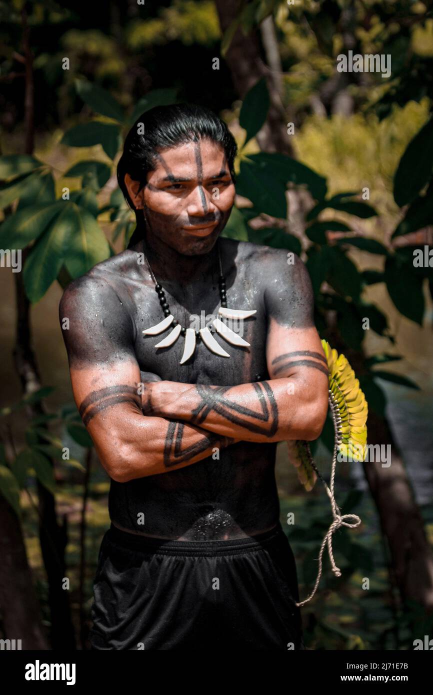 Indigenous young man from an Amazon tribe in Brazil, taking part in the Indigenous Games. Jogos Indígenas, Xingu River, 2009. Stock Photo