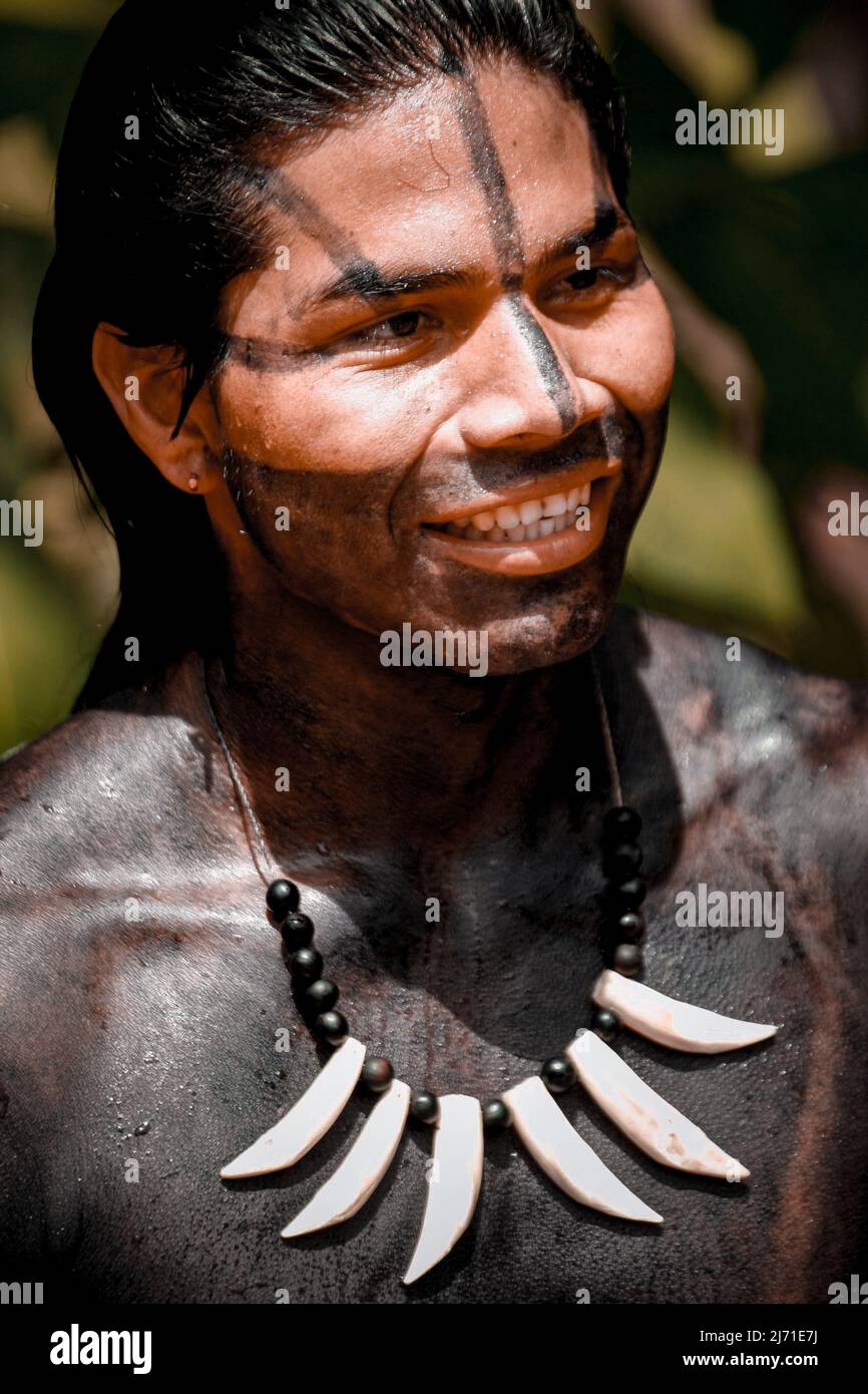 Indigenous young man from an Amazon tribe in Brazil, taking part in the Indigenous Games. Jogos Indígenas, Xingu River, 2009. Stock Photo