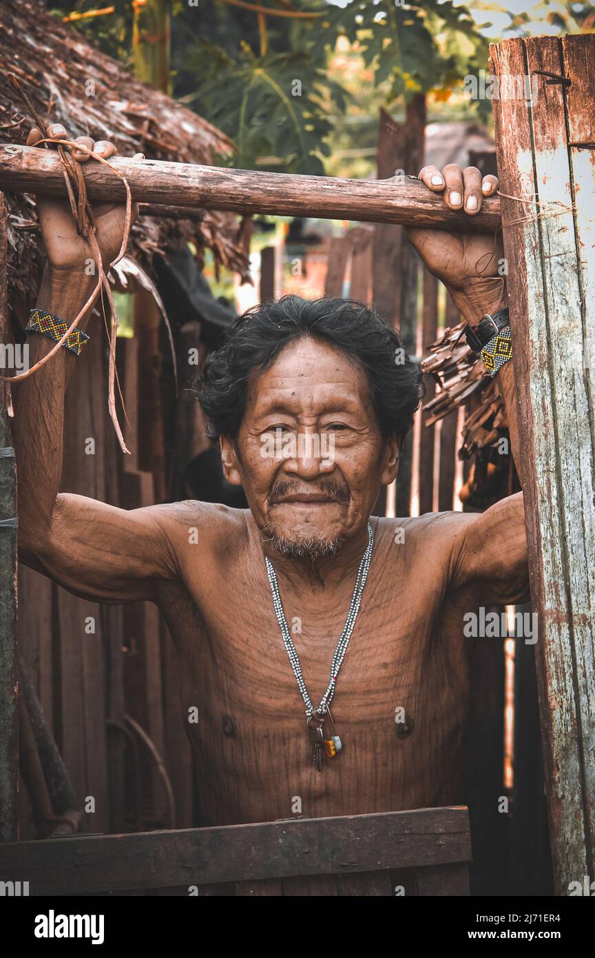 Senior member of an indian tribe in near Xingu River, Amazon, Brazil. 2007. Stock Photo