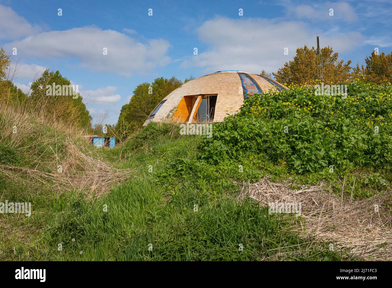Dome shaped UFO eco friendly building in eco-village Oosterwold Almere in the Netherlands Stock Photo
