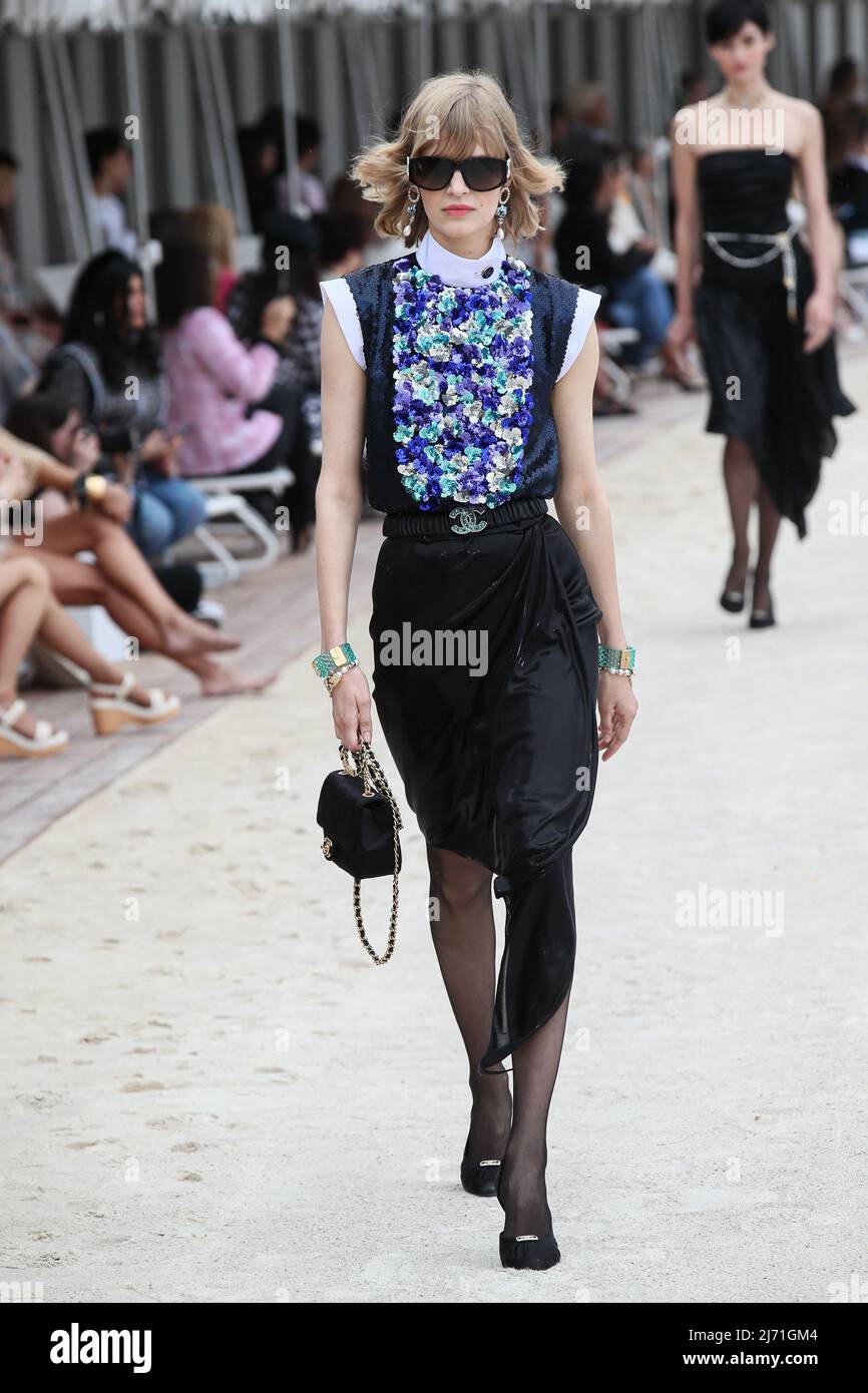 A model walks the runway during Chanel Cruise Collection 2022-23 held at  Monte Carlo Beach in Monaco. Monaco on May 5th, 2022. Photo by Marco  Piovanotto/ABACAPRESS.COM Stock Photo - Alamy