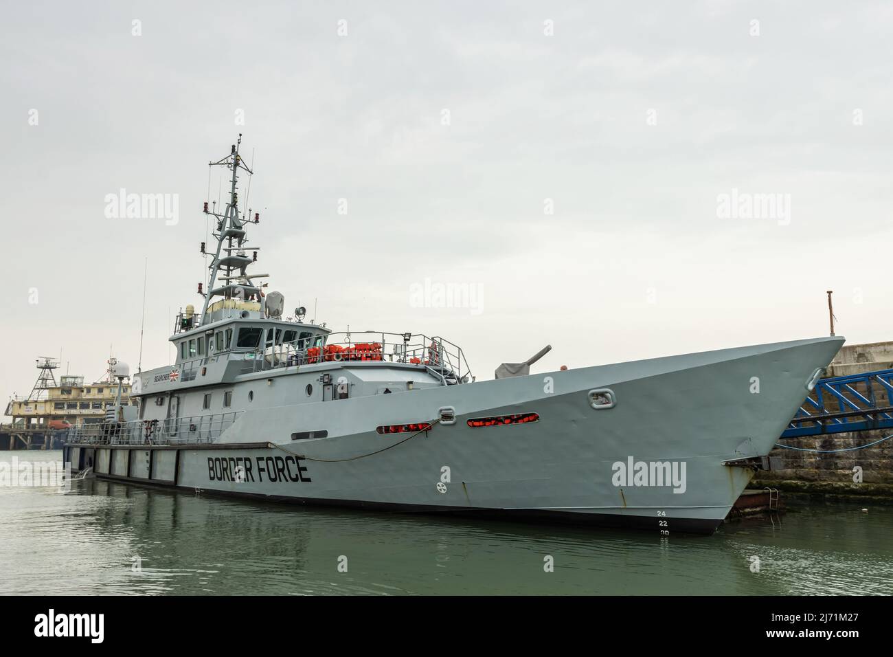 A border force vessel in Ramsgate after returning from assisting migrants near Dover, calm weather days in May 22, red life jackets visible on board Stock Photo