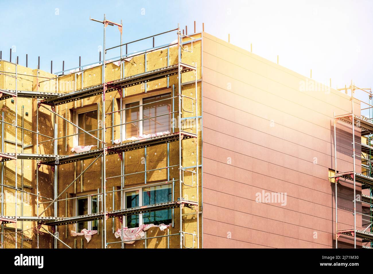 Picture of External wall insulation during spring season. Solid wall insulation ...