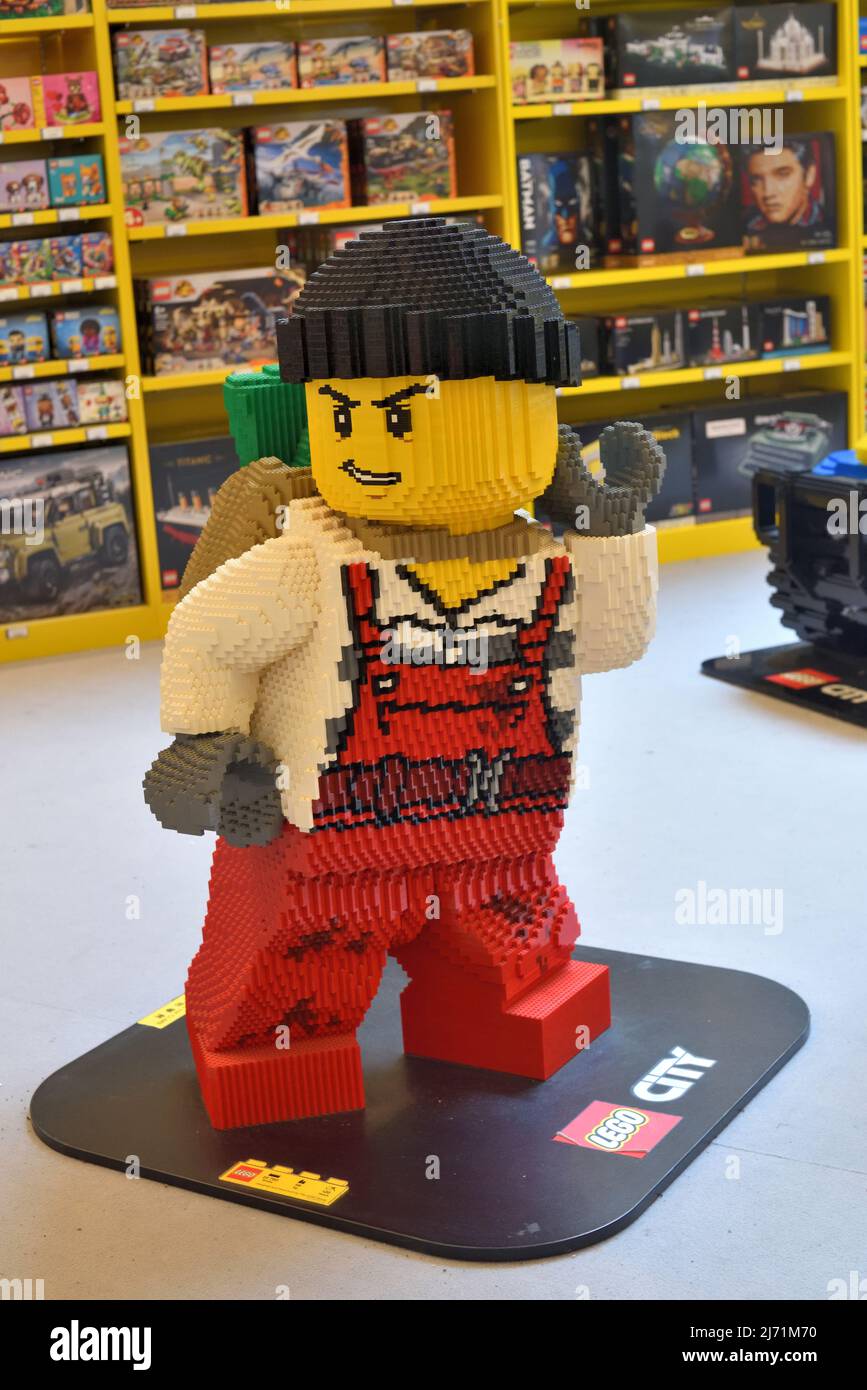 Lego block of figure in worker overall Stock Photo