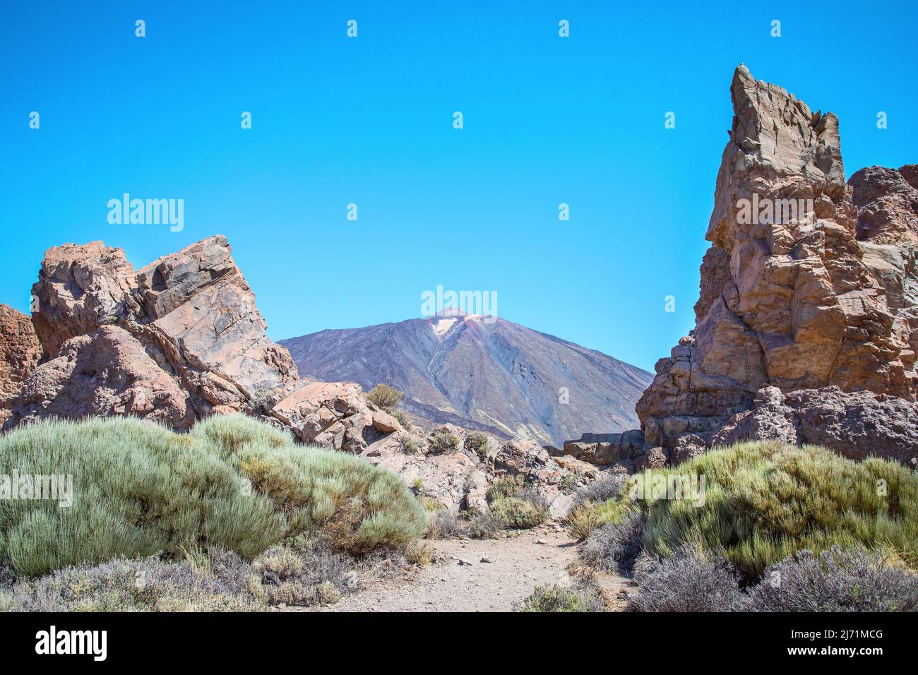 View of Volcano  El Teide   with volcanic rocks in The National Park of Las Canadas del Teide. Best place to visit  and walk in Tenerife Canary Island Stock Photo
