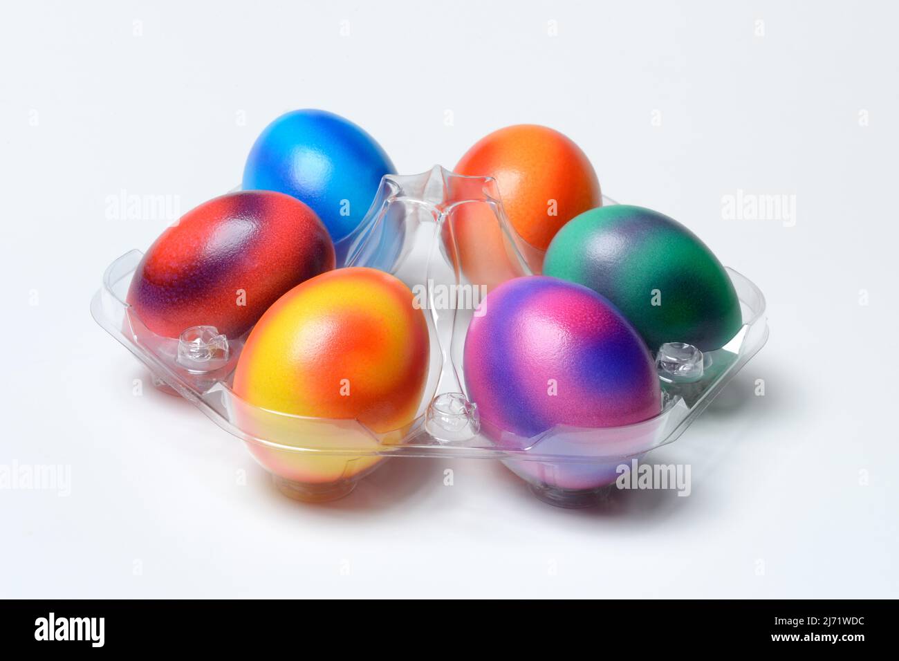 Gefaerbte Eier in Plastikverpackung, bunte Ostereier, Ostern Stock Photo