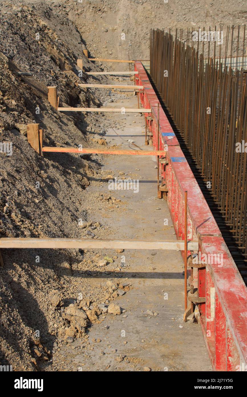 Formwork for a concrete wall was secured with lumber Stock Photo