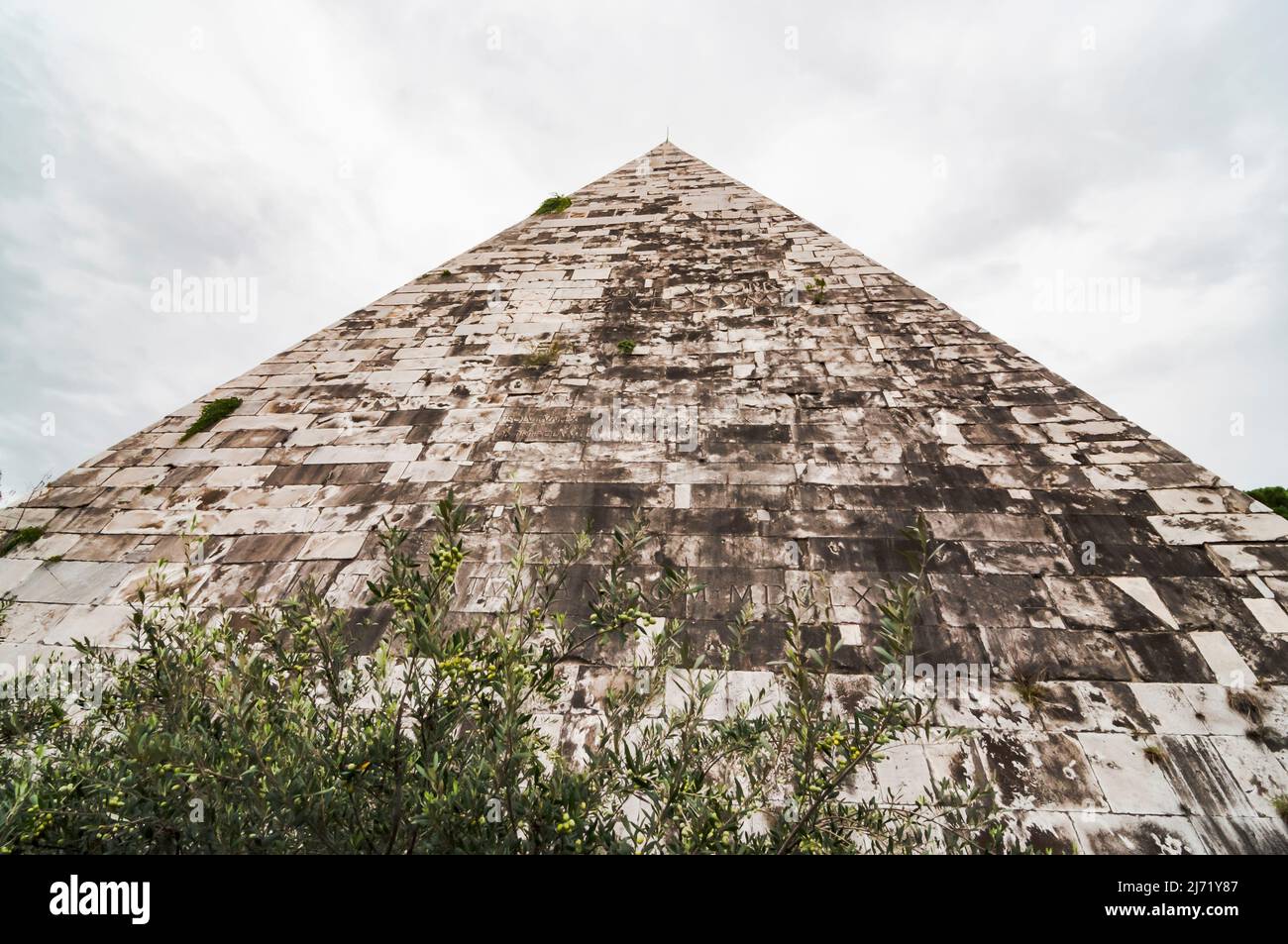 The Pyramid of Cestius Piramide di Caio Cestio or Piramide Cestia View from Piazzale Ostiense square. Rome, Lazio, Italy. Stock Photo