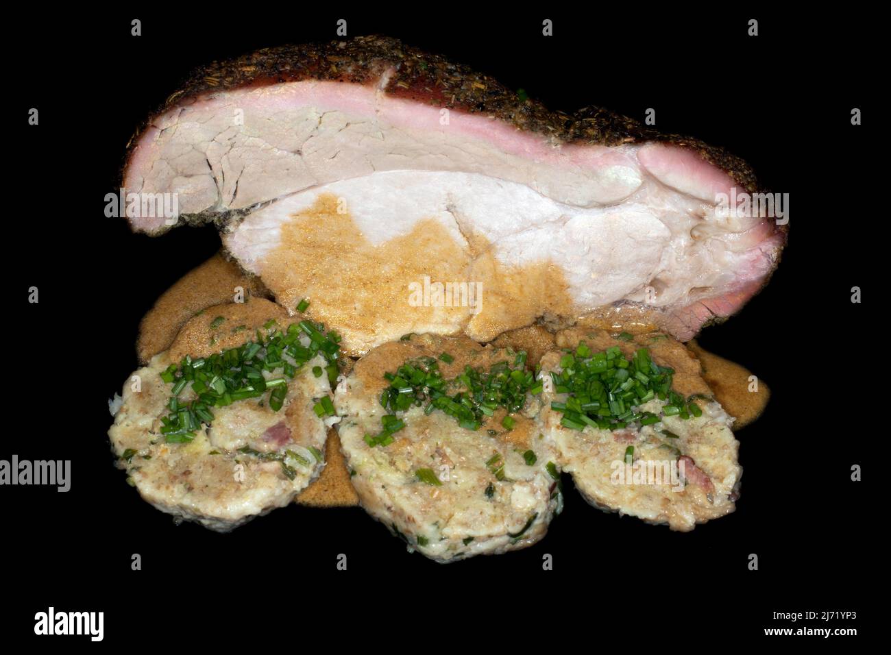 Schweinebraten mit Tiroler Speckknoedel, Schnittlauch und Sauce ... Schweinebraten mit Tiroler Speckknoedel, Schnittlauch und Sauce ...