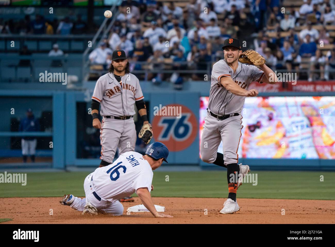 San Francisco Giants third baseman Kevin Padlo (49) turns a double play(00)