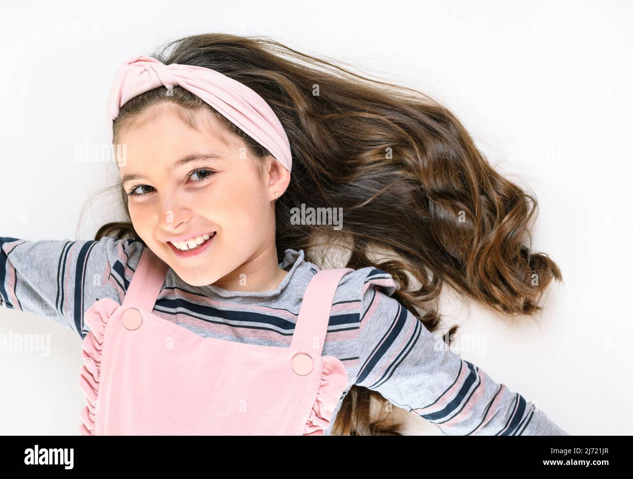 cute child lay over white background on studio Stock Photo